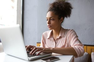 Young woman researching CTE Programs